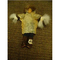 7" tall Eskimo doll with fur trim on parka and sleeve, wearing seal gut parka (2)