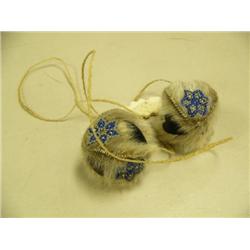 CHOICE on 2 fur and beaded Eskimo Yo-yos: blue with carved ivory handle (2)