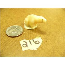 Carved Ivory polar bear - 1.25 " long (148)
