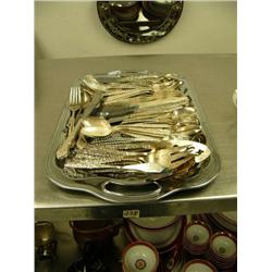 Lot of silverware and silver colored tray: butter knives, spoons, forks, ladle and serving spoons (1