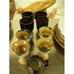 Lot of 9 glazed cups: 4 blue, 4 green and white, 1 black mug (168)