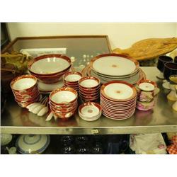 Lot of approx. 74 piece china set: red with gold colored detail, made in Taiwan (168)