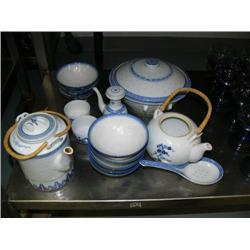 Lot of approx. 16 piece china set: 2 teapots, 2 small cups, 8 bowls, spoon holder, large dish with t