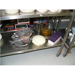 Lot of misc. kitchen items: 2 glass pitchers, serving bowl with top, large silver colored turkey pla