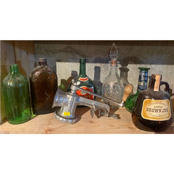 Antique Bottle Collection With Antique Meat Grinder