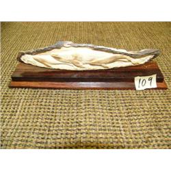 Imported ivory relief carving of whales on wood base - 7" long (2)