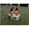 Image 1 : Pair of ivory puffins by R. Kokuluk - 1.5" x 1.5" diameter (2)