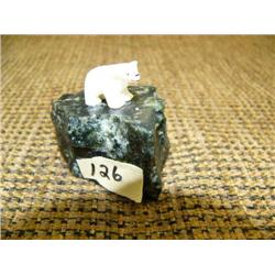 Very small ivory bear on soapstone (2)