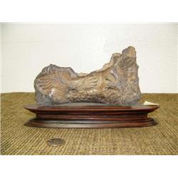 Imported eagle relief carving in bone on wood base 7.5" long 5" high (2)