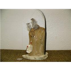 Alaska native scene with relief bone carving of  whale, ivory mask, baleen, feathers on bone base 6"