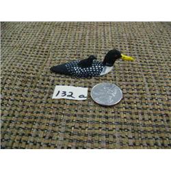CHOICE on 3 ivory birds 2" long by Charlie Kokuluk: yellow billed loon with baby on back (2)