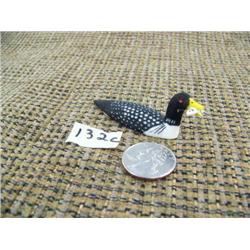 CHOICE on 3 ivory birds 2" long by Charlie Kokuluk: yellow billed loon with fish in mouth (2)