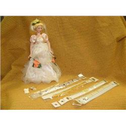Lot of 6: 4 costume jewelry bracelet, ivory necklace on gold chain, collectable doll on stand with p