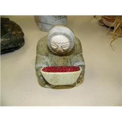 Alaska Native soapstone figure with bone face and berries 5" tall, 4" wide, by E.S. (33)