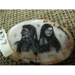 Imported fossilized ivory belt buckle, with American Indian male and female figure (33)