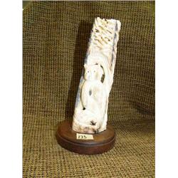 Ivory prospector and owl on wood base 8" tall, 4" diameter (33)