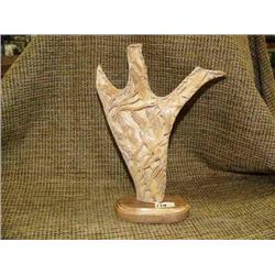 Imported salmon of antler on wood base 9.5" tall, 8" diameter (33)