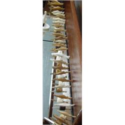 Lot of 25 salmon on ivory or bone bases (33)