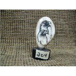Ivory platchet with 2 scrimshawed eagle heads on wood base (33)
