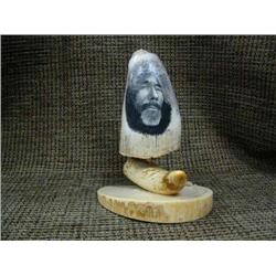 All ivory very intricately scrim alaska native face with unreadable signature (33)