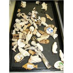 Huge lot of ivory, bone and antler small carvings (33)