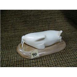 Ivory walrus on ivory base by Bernard Toolie 5" long 2" tall (33)