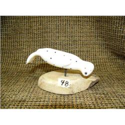 Ivory seal on bone base with inlaid baleen 4" long (33)