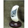 Image 1 : Intricately carved whale's tooth of whale breaching with totems nearby signed by Peter Kwray 6" tall