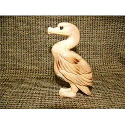 Fossilized ivory bird 4" tall (33)