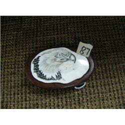 Ivory belt buckle with eagle signed T. (33)