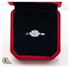 Image 1 : #102-HAND SET 1.00 CT ICE BLUE ROUND BRILLIANT CUT