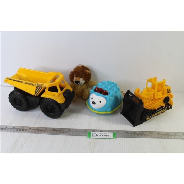 Plastic Dump Truck & Plow - Stuffed Lion - Battery Operated Toy
