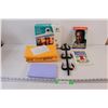 Image 1 : Lot of: ShamWow!, Metal Gun Rack, Quick Cam Set (As Is), Bill Cosby Book, Puzzles