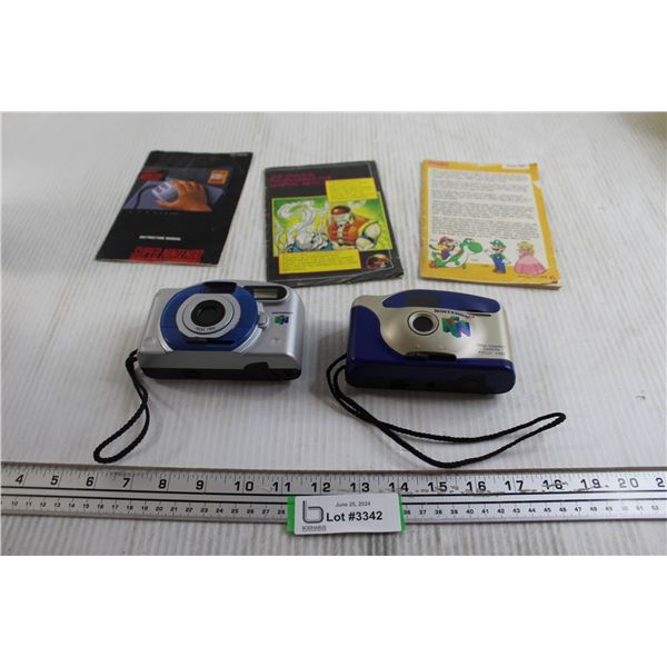 (2) N64 Cameras - Untested, (3) Game Manuals