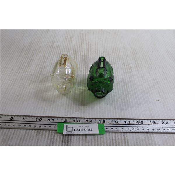 Green and Clear Glass Piggy Banks