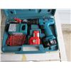 Image 1 : makita cordless drill -- batteries need replacement