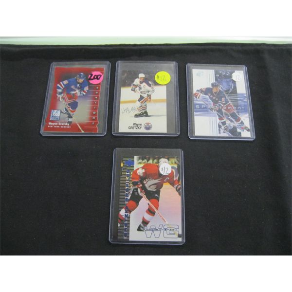 4 WAYNE GRETZKY HOCKEY CARDS