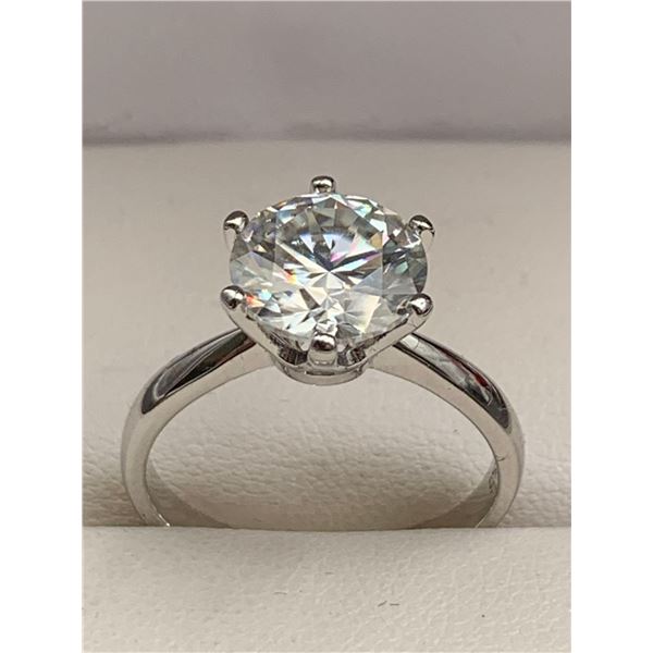 3.00 CT GRA CERTIFIED VVS D IN COLOR MOISSANITE SET IN 6 CLAW HEAD THAT IS IN A STERLING SILVER RING