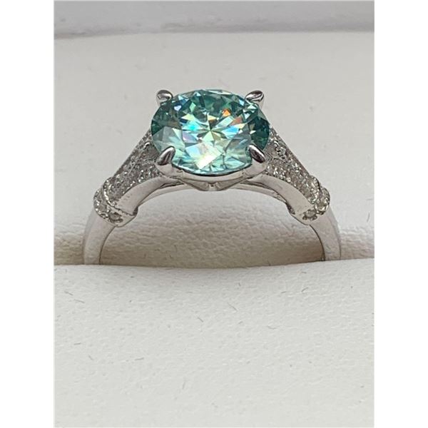 3.00 CT GRA CERTIFIED MOISSANITE VVS BLUE IN COLOR SET IN THE CENTER WITH THE 30 ROUND CUT CUBIC ZIR