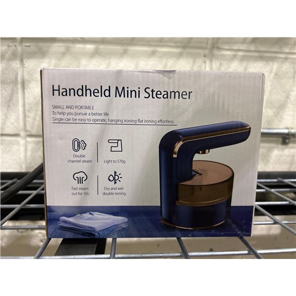 Handheld small and portable mini clothing steamer
