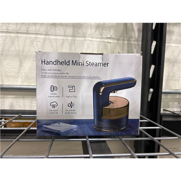 Small and portable handheld mini garment steamer