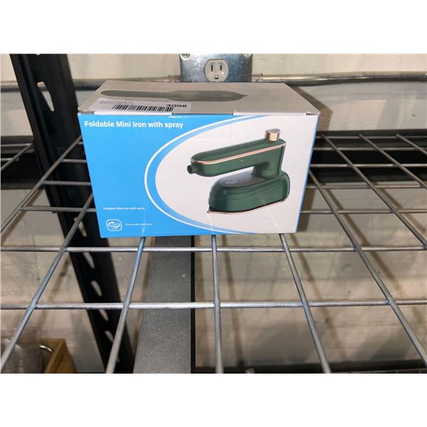 Foldable mini clothing iron with spray function
