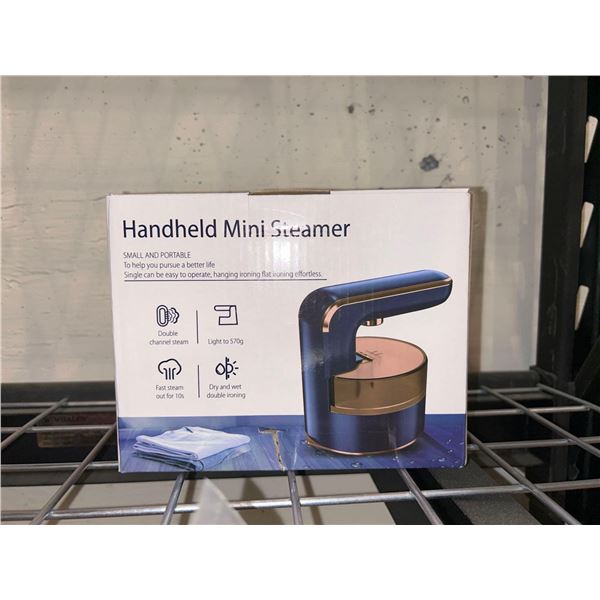 Small and portable handheld mini garment steamer