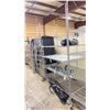 Image 2 : ULINE 4 TIER STAINLESS STEEL METRO STYLE MOBILE RACK WITH BLACK/CLEAR ZIP UP ULINE COVER