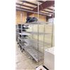 Image 2 : ULINE 4 TIER STAINLESS STEEL METRO STYLE MOBILE RACK WITH BLACK/CLEAR ZIP UP ULINE COVER