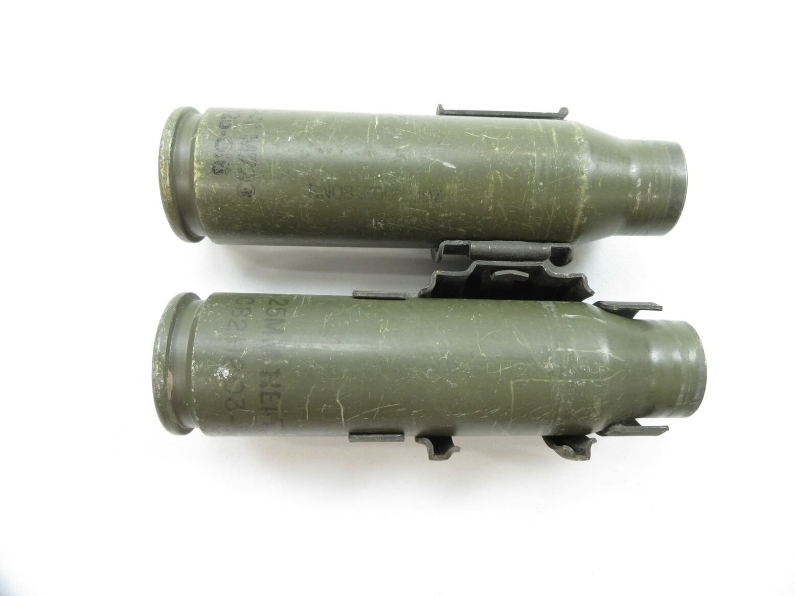 CANADIAN MILITARY 25MM STEEL SHELL CASING AND LINK LOT