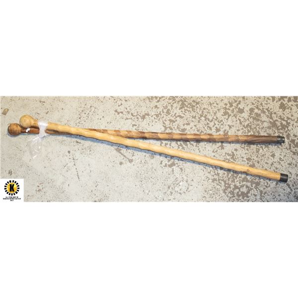 2 WOODEN WALKING STICKS CARVED