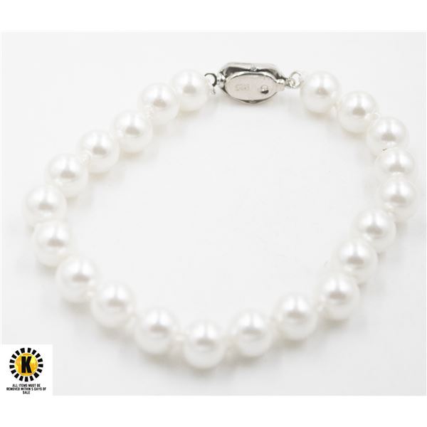 #49-SEA SHELL PEARL BRACELET 7.5"