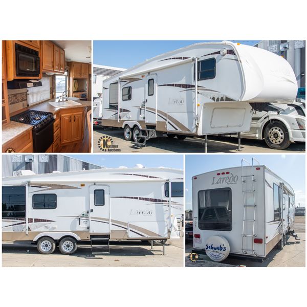 FEATURED 2007 KEYSTONE LAREDO HOLIDAY TRAILER