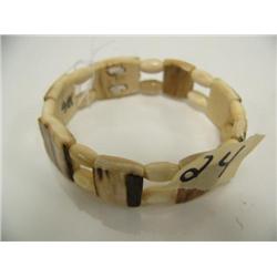 Fossilized ivory bracelet by H.K., (2)